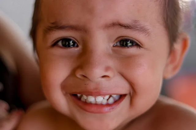 Smiling young boy ready for his back-to-school dental checkup