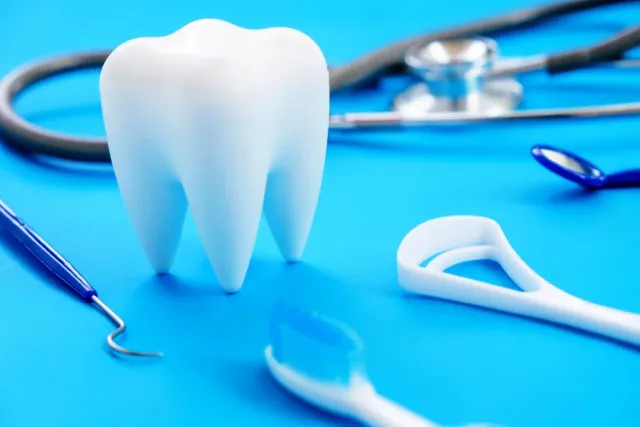 Patient calling Peninsula Dentistry for an emergency dental appointment in Huntington Beach